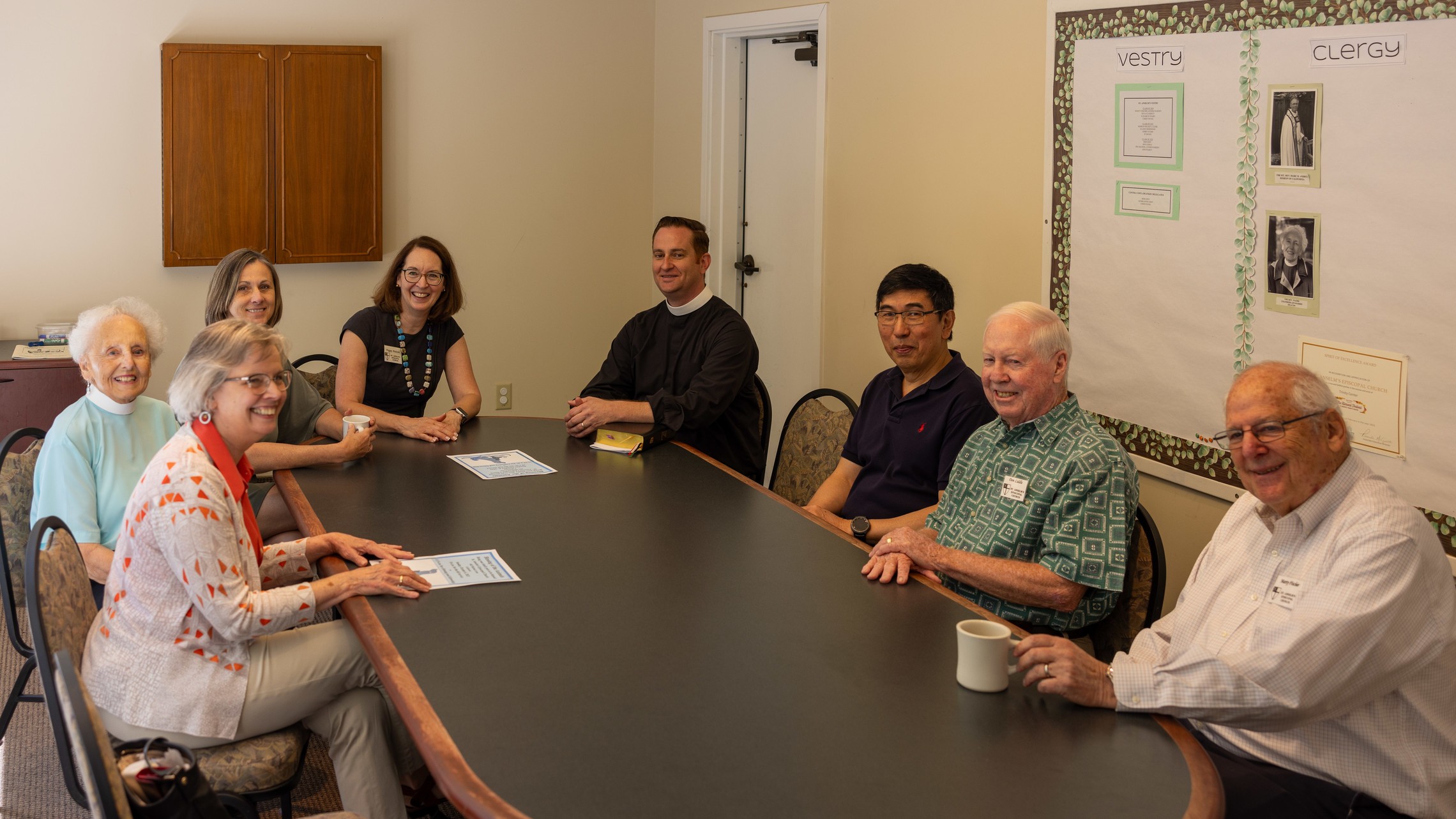 Members of the vestry gathered around a table Vestry 2023
